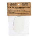 Back view of the snowy gray NOSO Gear Repair Patch packaging showing application instructions and Town Hall branding - easy peel-and-stick waterproof patch for extending the life of outdoor gear.