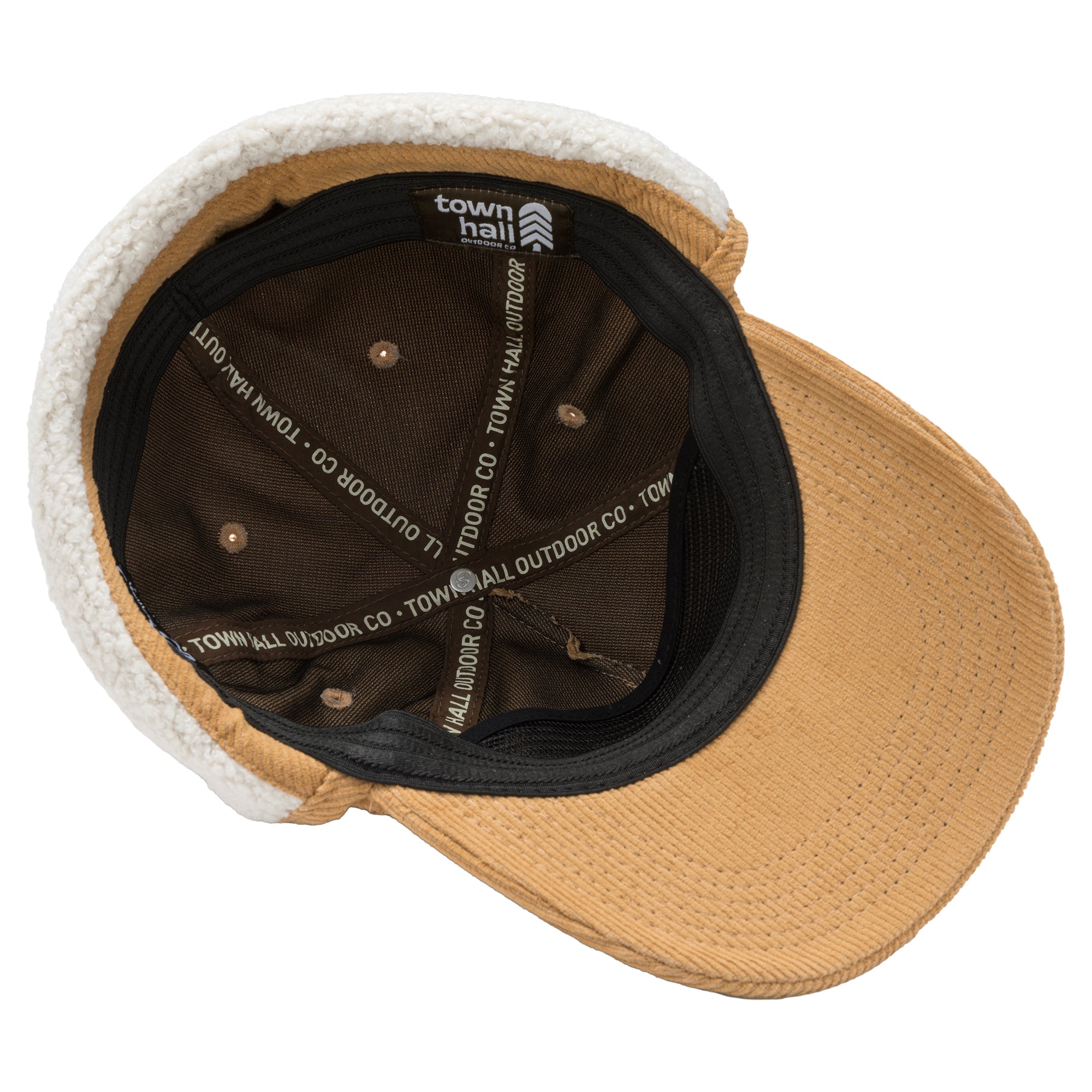 Inside view of our adult ear flap hat revealing the soft fleece lining that provides serious warmth while maintaining that quirky mountain style we love.