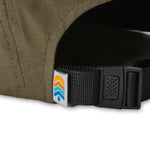 Close-up of the Five Panel Hat's back adjustable nylon closure with clip system, allowing for customizable fit and easy packing for adventures on the go.
