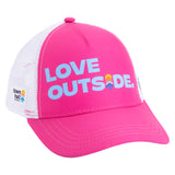 Pink Kids Trucker Hat with blue Love Outside lettering, curved brim, white mesh panels and Town Hall side logo.