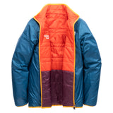 Teal Skip Town Insulated Jacket unzipped to reveal its orange and plum quilted reverse side.
