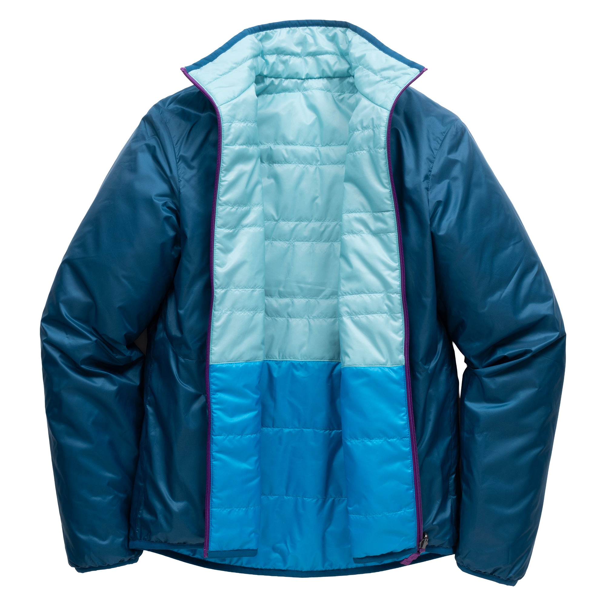 Dark teal side of women's OuttaTown Reversible Jacket unzipped to reveal aqua and blue quilted panels.