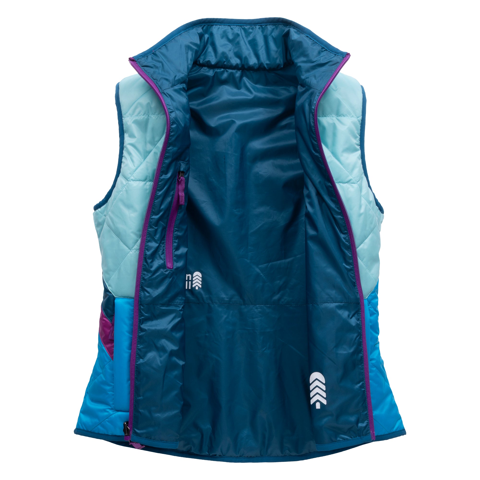 Blue puffy reversible vest for women laid open for the inside blue to see.