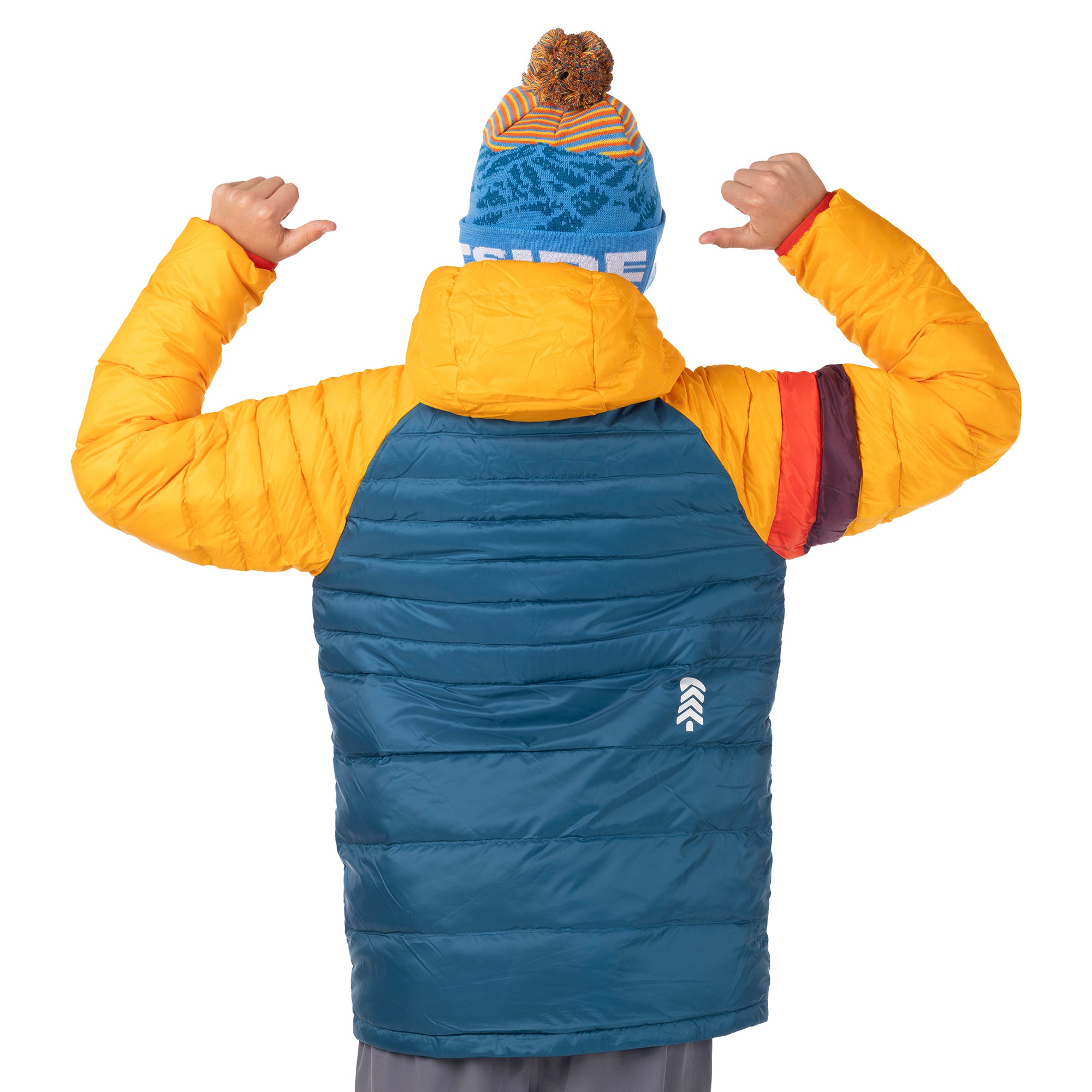 Child modeling the yellow and teal Town Hall Down Town Puffy kids puffer jacket, back view with arms raised.