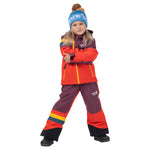 Child wearing the blue Town Hall Kids Love Outside Beanie with an orange and purple ski jacket and snow pants.