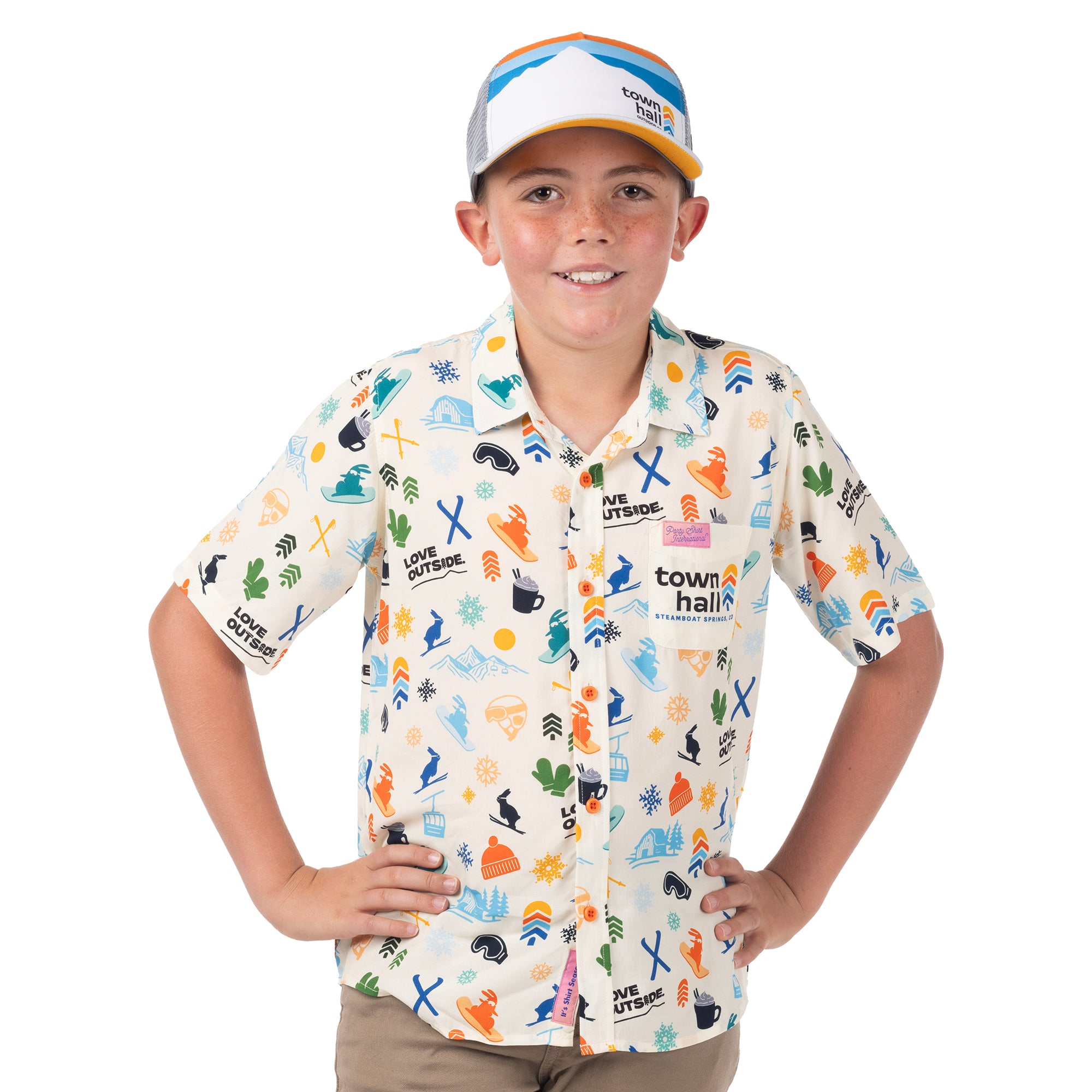 Child modeling the front of Town Hall Kids Cabana Shirt in Vanilla, showing short sleeves and a logo chest pocket.