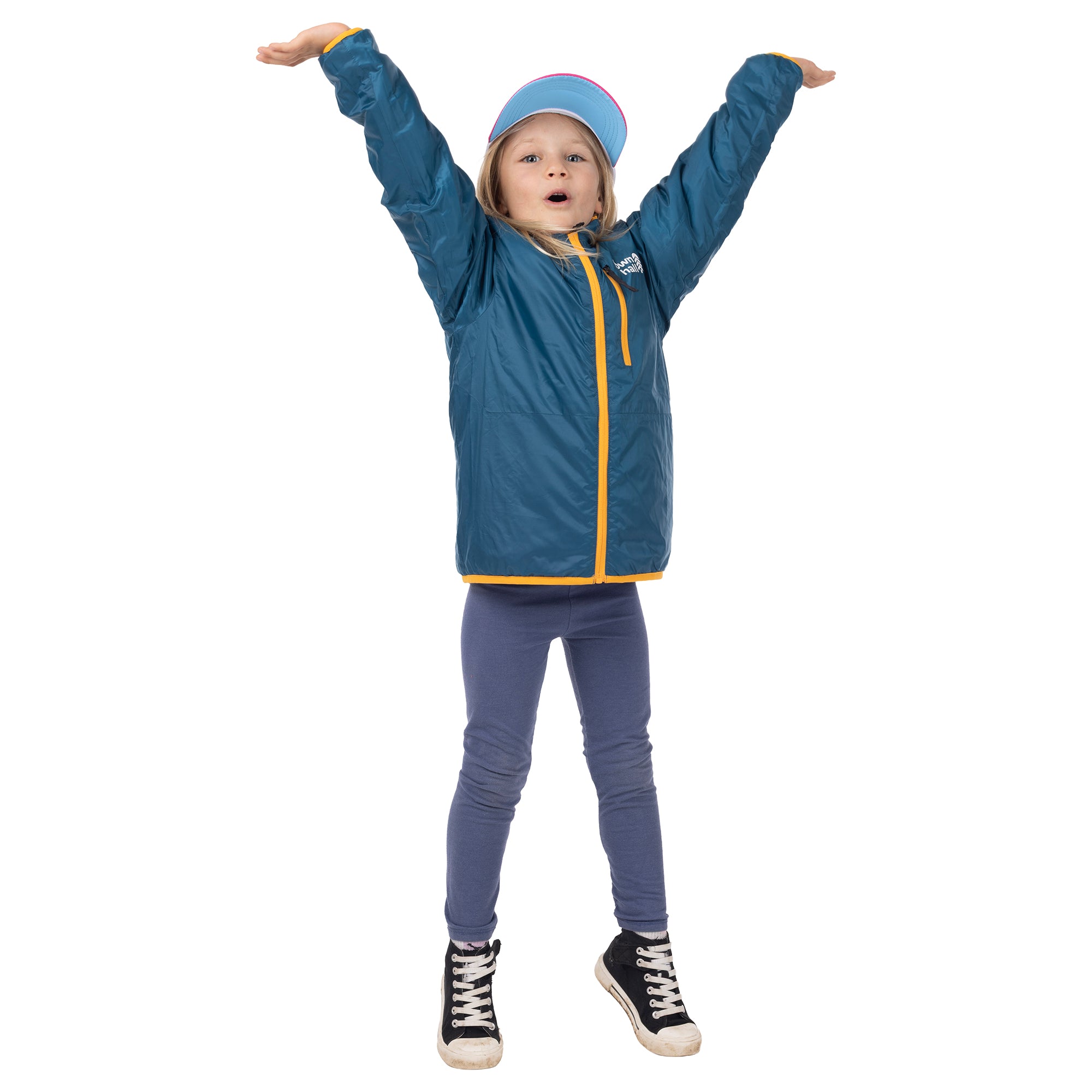 Child raising both arms while wearing the teal reverse side of the Skip Town Insulated Jacket with yellow trim.