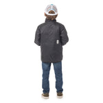 Back view of boy wearing the reversed Skip Town insulated jacket, showing the smooth fit and freedom of movement for active outdoor adventures.