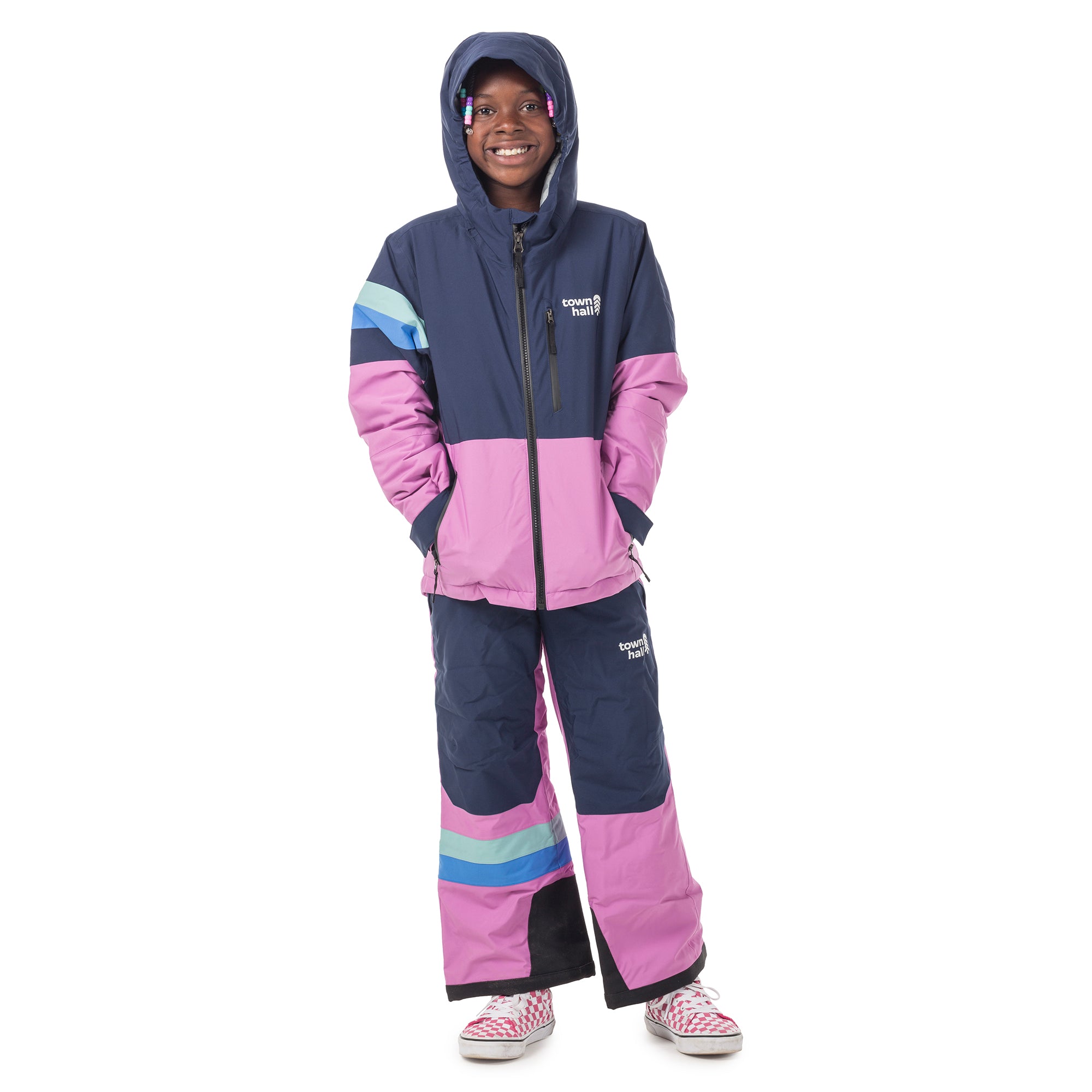 Child model in Town Hall's Mulberry/Black Iris Mountain Town Winter Bib and matching jacket - sustainable snow pants designed for active kids who love outdoor winter adventures.