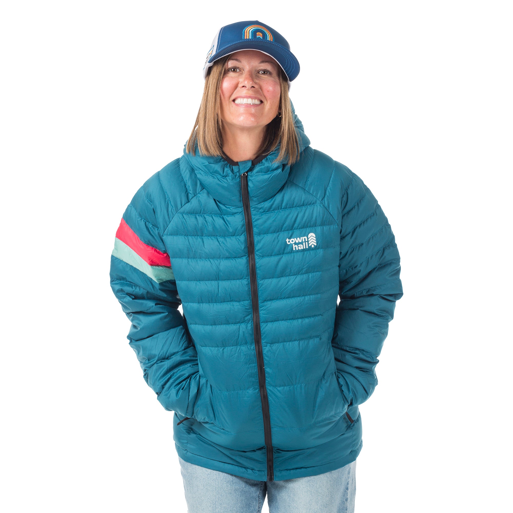 Adult woman modeling Town Hall's Adult Down Town Puffy jacket, featuring a weather-resistant finish and cozy insulation for outdoor activities and everyday warmth.