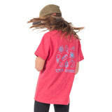 Girl wearing our ruby red Kids Summertime Tee showing the playful nature-inspired design on the back, perfect for warm weather adventures and outdoor exploration.