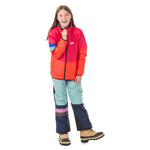 Teen girl in Rose Red Skip Town insulated jacket with Town Hall logo, demonstrating the perfect lightweight warmth for hiking, biking and everyday adventures.