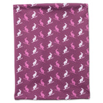 Magenta double wall neck gaiter featuring playful bunny on skis pattern, perfect for keeping warm and cozy during chairlift rides and powder days.