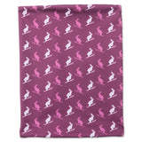 Magenta double wall neck gaiter featuring playful bunny on skis pattern, perfect for keeping warm and cozy during chairlift rides and powder days.