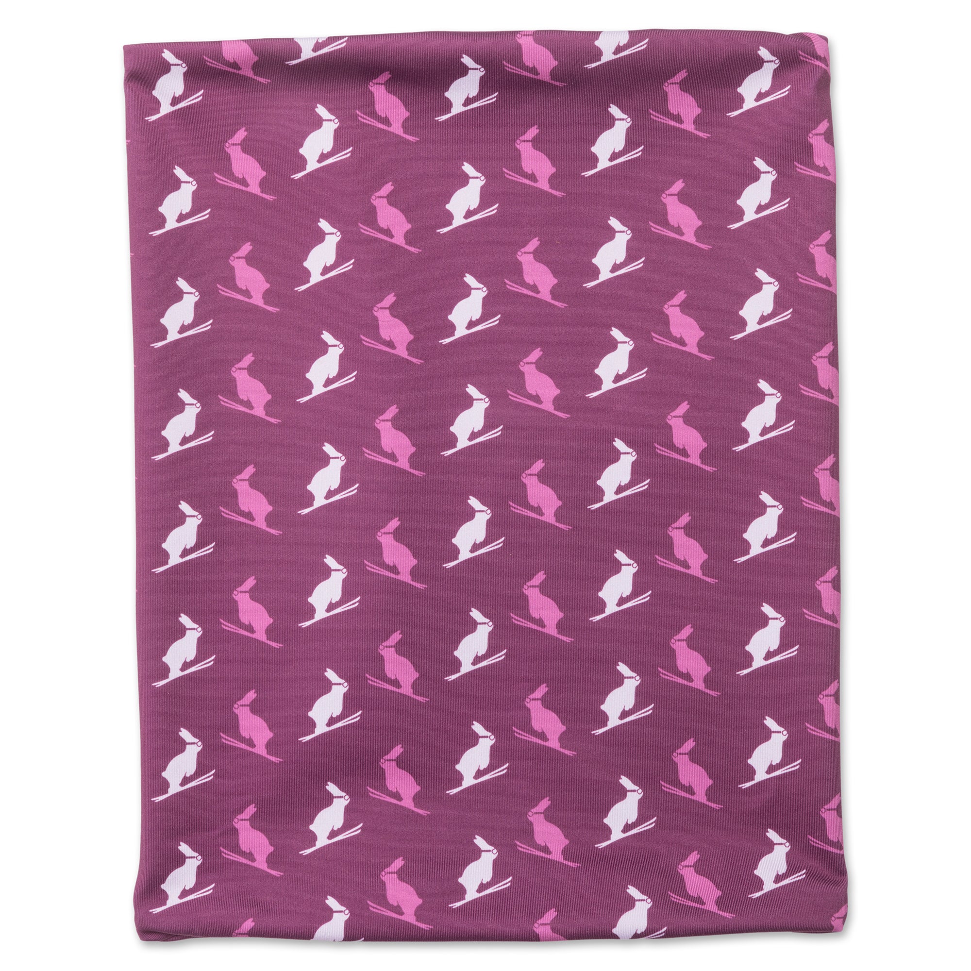 Magenta double wall neck gaiter featuring playful bunny on skis pattern, perfect for keeping warm and cozy during chairlift rides and powder days.