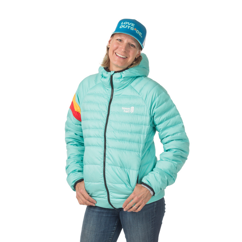 Adult woman modeling the versatile Adult Down Town Puffy jacket from Town Hall, designed for everyday warmth from school drop-offs to trail adventures.