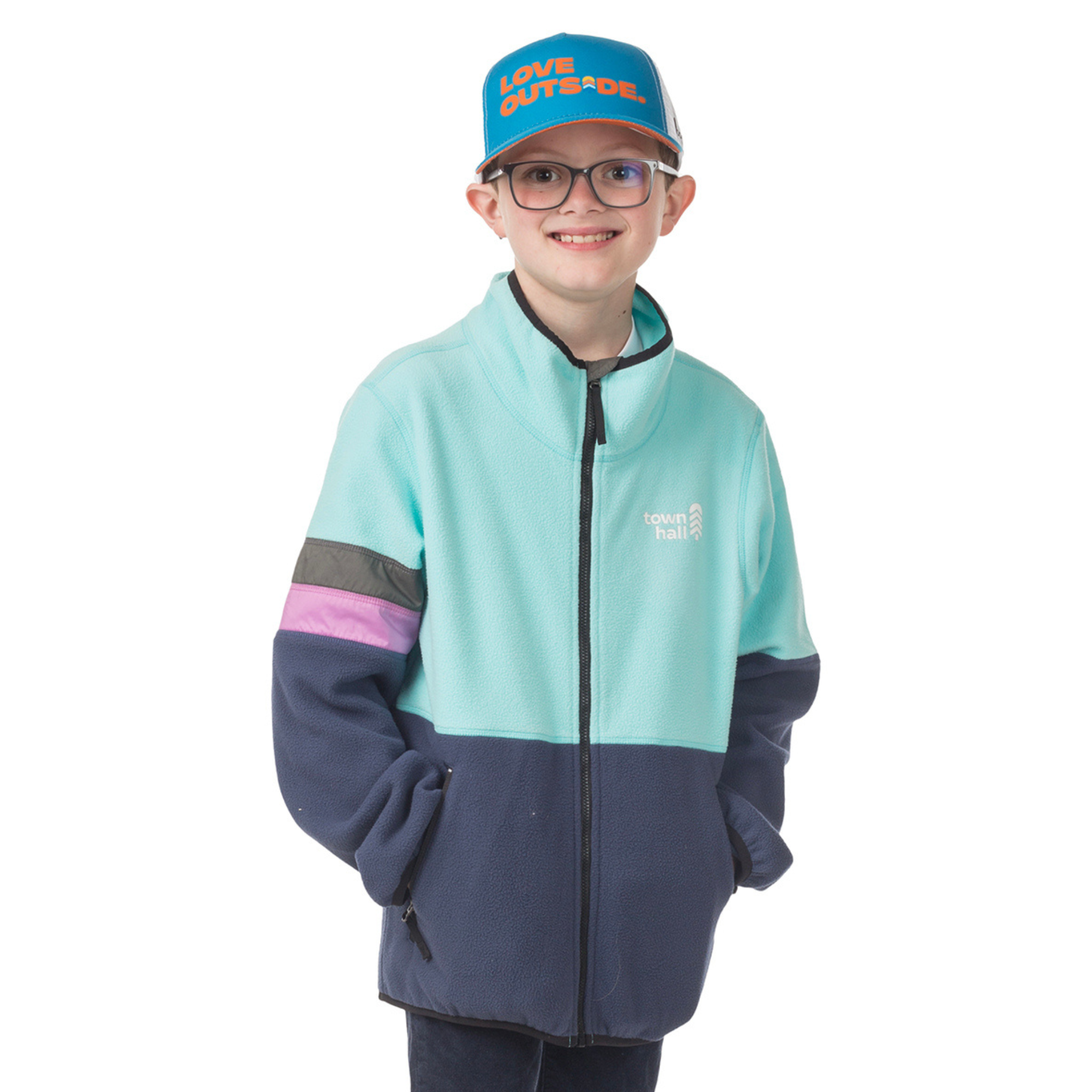 Child modeling our Midtown Fleece Jacket in Aqua Sky with Black Iris accents, showing the Town Hall logo and comfortable fit great for layering during all seasons.