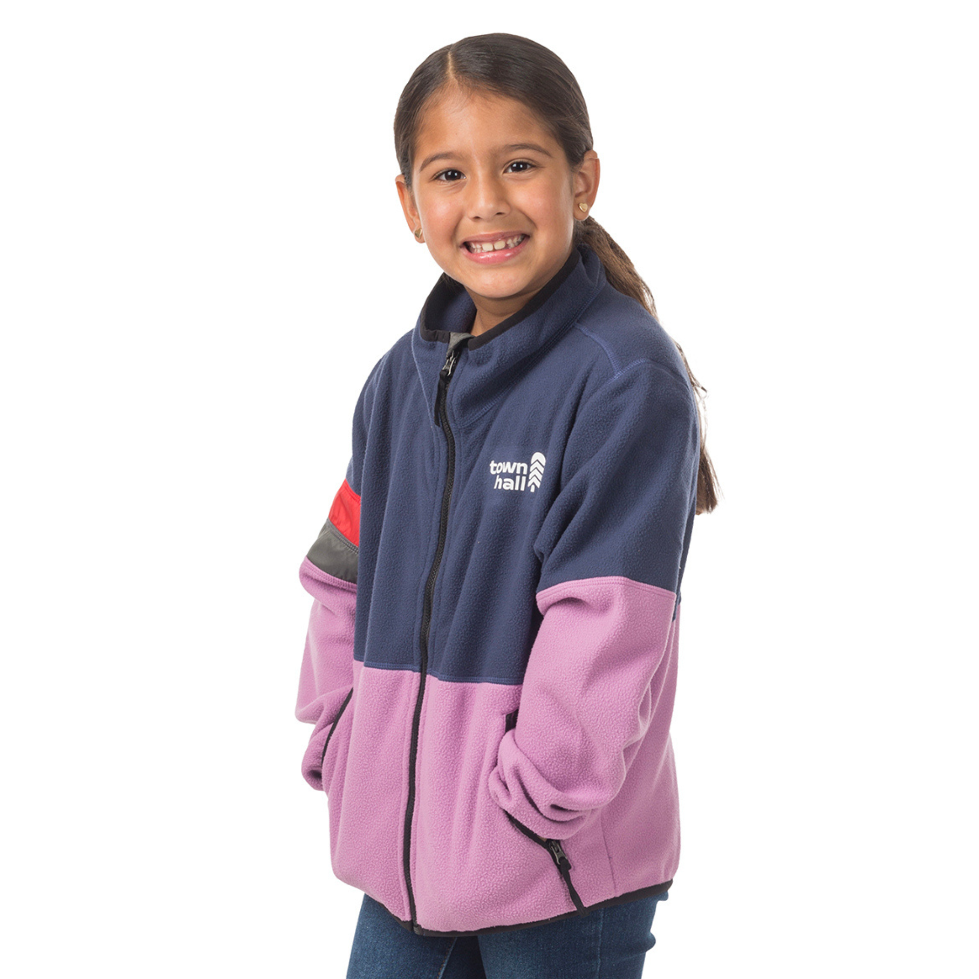 Girl wearing the Midtown Fleece Jacket in Mulberry with Black Iris, featuring the Town Hall logo and cozy design perfect for year-round adventures and outdoor play.
