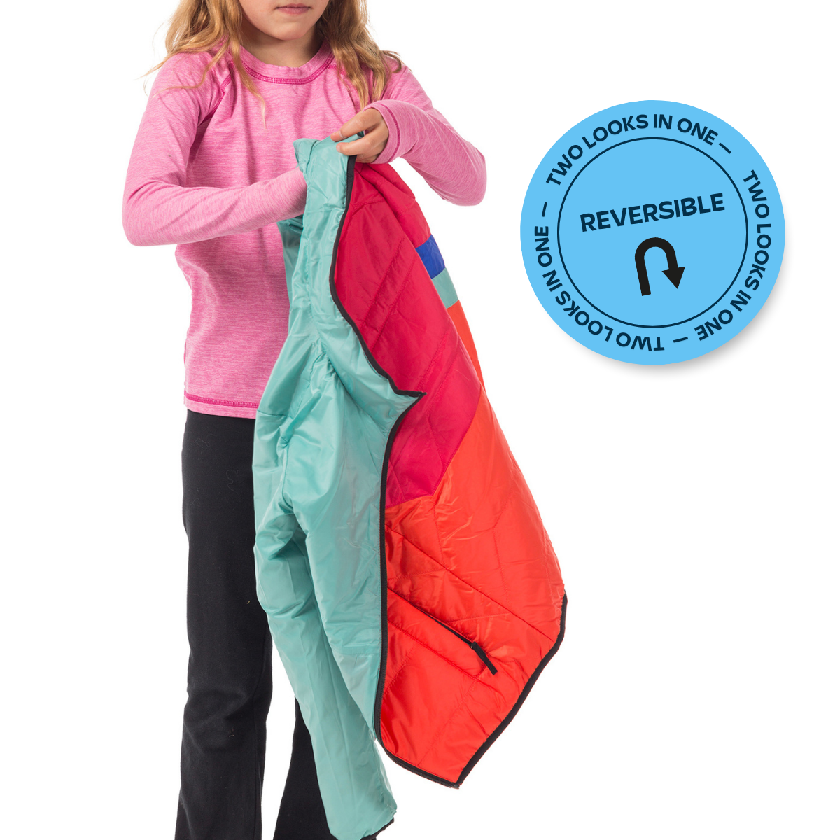 Child holding a reversible colorful jacket with a blue label indicating 'Two Looks in One'.
