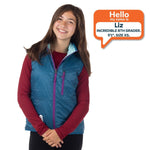 8th grade girl standing with XS size puffy vest on.