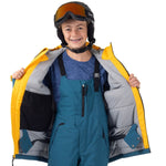 Child holding a yellow Mountain Town winter jacket open to show quilted lining, stash pocket, and powder skirt.