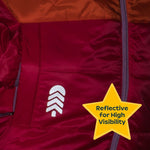 Close-up of white Town Hall logo on a red jacket with a Reflective for High Visibility badge.