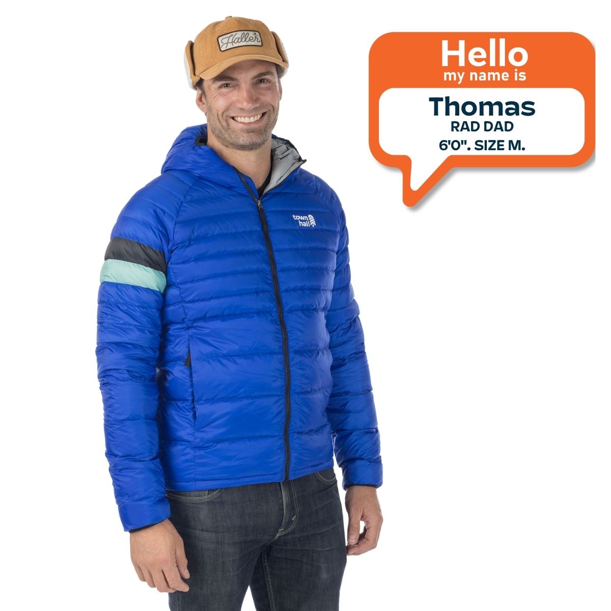 Thomas, 6 feet tall, wearing a size medium Town Hall Adult Down Town Puffy blue down jacket.