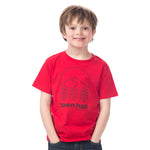 Young boy wearing our red Kids Town Slope Tee with Town Hall logo, ready for mountain adventures and après ski hangouts.