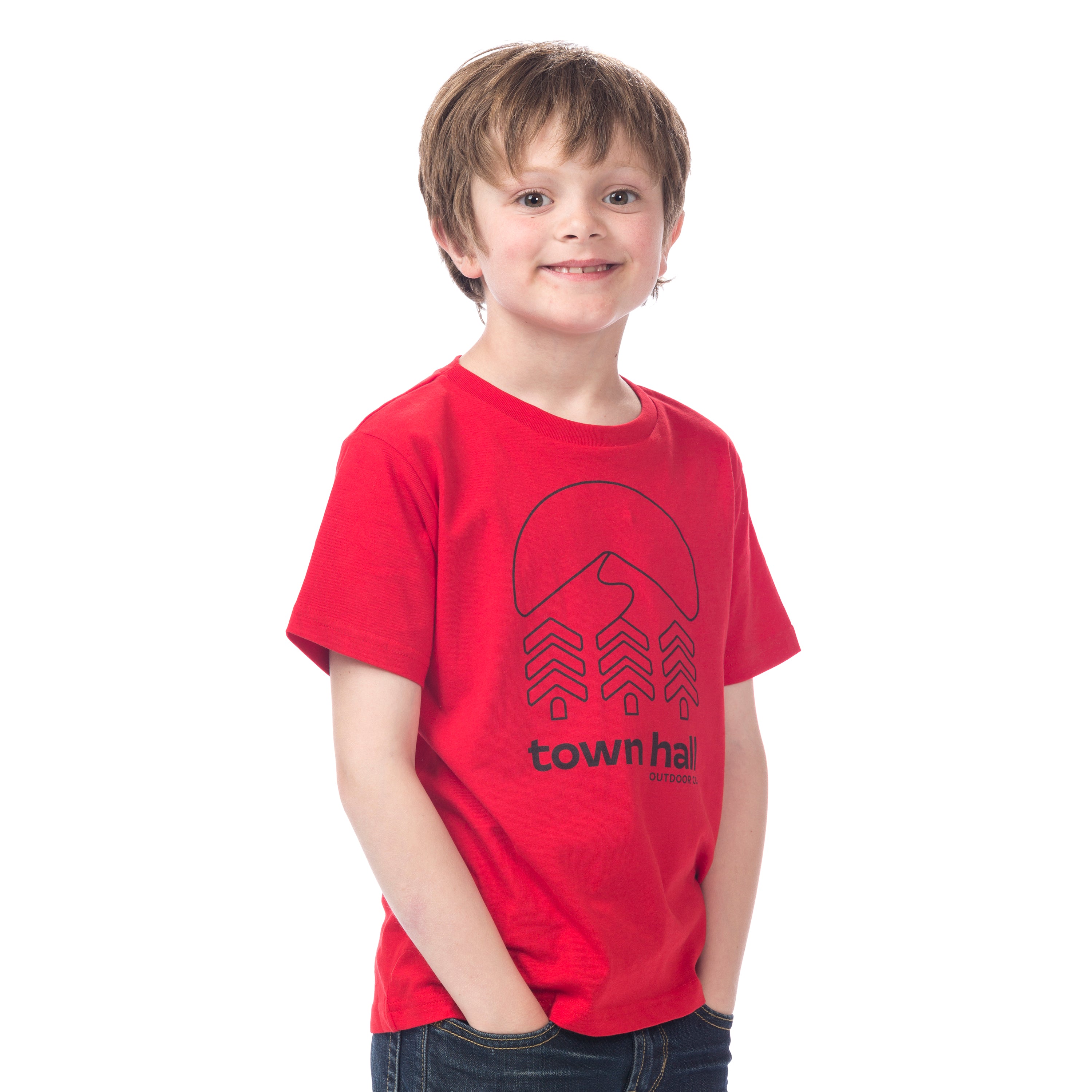 Boy modeling the red Kids Town Slope Tee featuring the Town Hall logo, perfect for ski days and outdoor playtime.