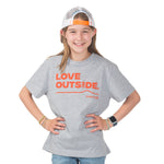 Playground-ready girl in our sustainable Heather Gray Kids Love Outside Tee with Town Hall logo for all-day comfort.