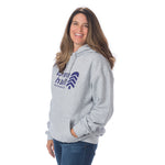 Woman shown from side angle modeling the cozy Town Hall Logo Hoodie Sweatshirt in Heather Gray, highlighting the gender-neutral fit and ribbed cuffs.