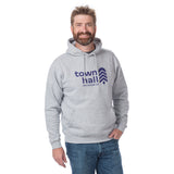 Man wearing the super comfortable Adult Town Hall Logo Hoodie in Heather Gray, featuring sustainable fabric blend and front pouch pocket perfect for outdoor adventures.