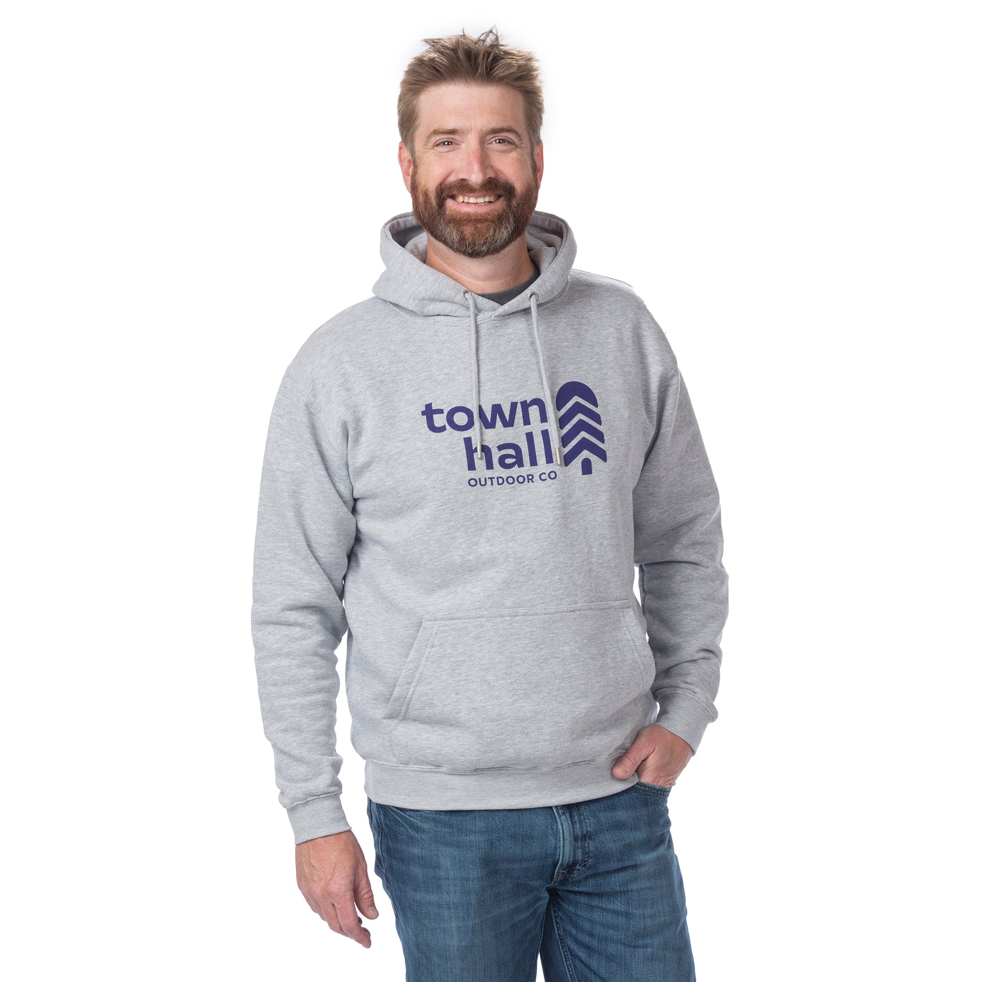 Man wearing the super comfortable Adult Town Hall Logo Hoodie in Heather Gray, featuring sustainable fabric blend and front pouch pocket perfect for outdoor adventures.
