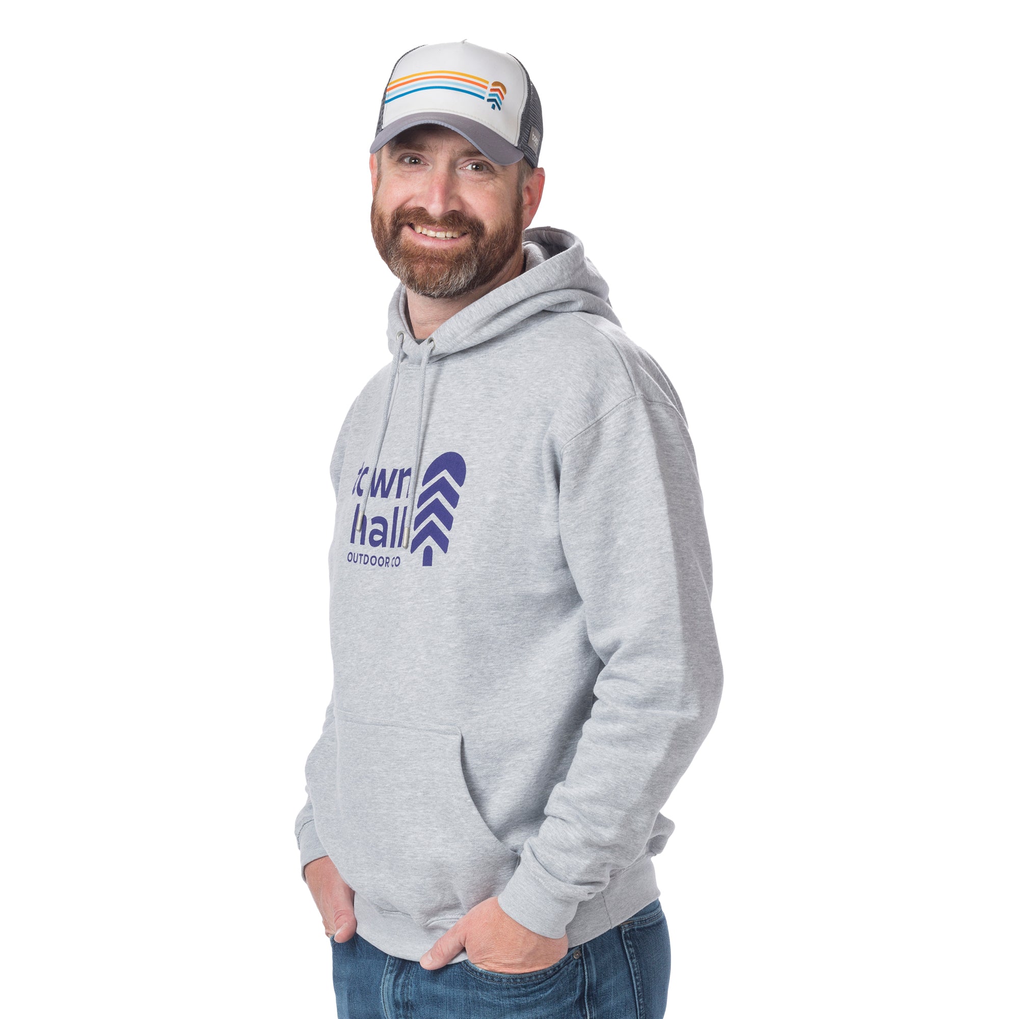 Man turned slightly sideways wearing the sustainable Town Hall Logo Hoodie in Heather Gray, showcasing the drawcord hood and classic front pouch pocket.